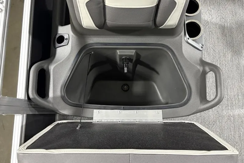 Slide: The Image of 2026 Sun Tracker Bass Buggy 18 DLX boat seat with storage compartment and cup holders. - 11