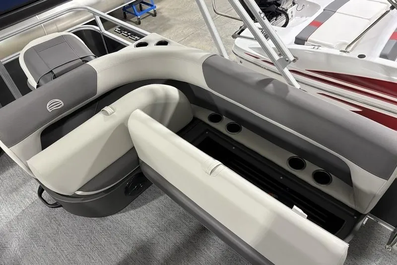 Slide: The Image of 2026 Sun Tracker Bass Buggy 18 DLX pontoon boat with spacious seating and cup holders. - 14