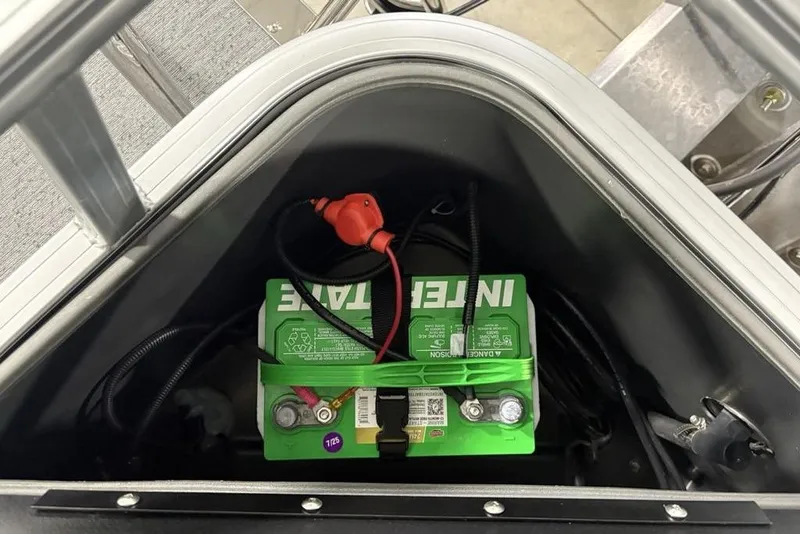 Slide: The Image of Battery compartment of 2026 Sun Tracker Bass Buggy 18 DLX pontoon boat. - 22