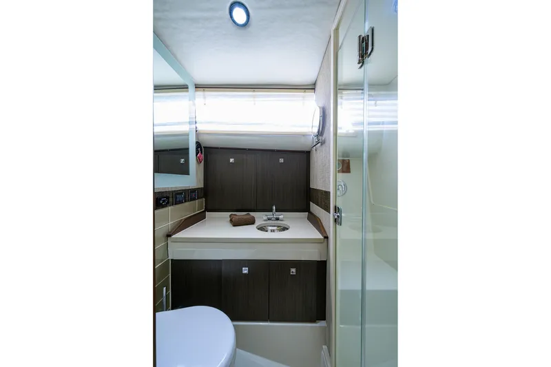 Slide: The Image of 1965 Bertram 38 Sport Fisherman bathroom with modern fixtures and sleek design. - 40