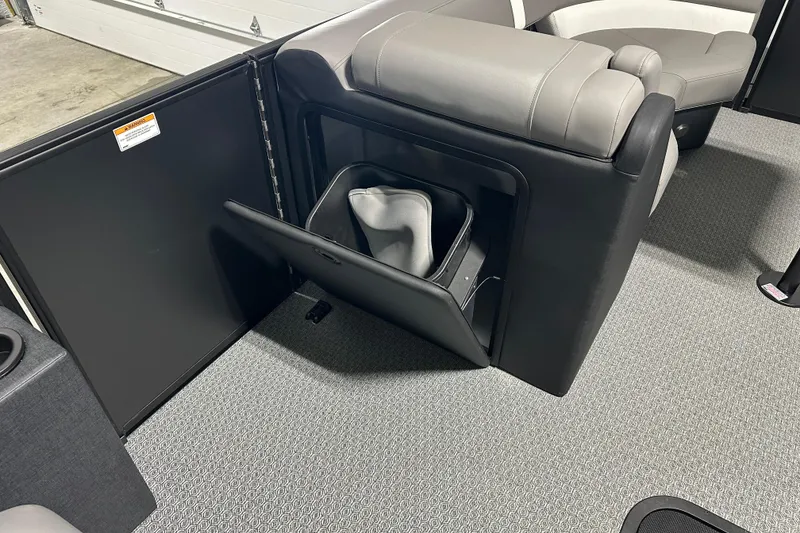 Slide: The Image of Evotti 521QL 2026 model with open storage compartment and gray seating. - 5