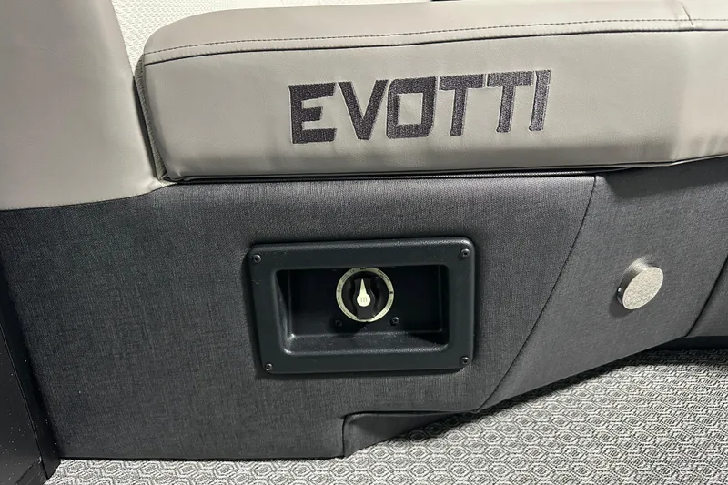 Slide: The Image of Gray Evotti 521QL seat detail with logo and control panel, 2026 model. - 7