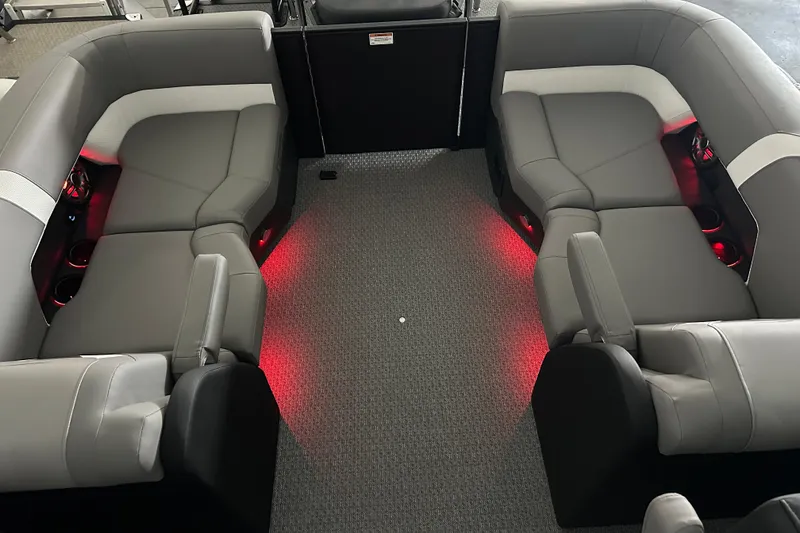 Slide: The Image of Luxurious interior of 2026 Evotti 521QL boat with gray seating and red ambient lighting. - 9