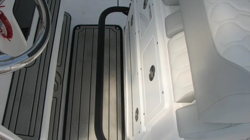 Slide: The Image of Interior of 2023 Sea Fox 288 Commander with seating and steering wheel. - 19