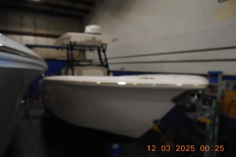 Slide: The Image of 2023 Sea Fox 288 Commander boat in indoor storage facility. - 21