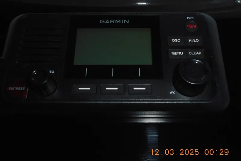 Slide: The Image of Garmin marine radio on 2023 Sea Fox 288 Commander boat dashboard. - 30