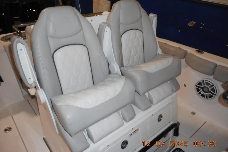 Slide: The Image of 2023 Sea Fox 288 Commander boat seats with gray and white upholstery. - 32
