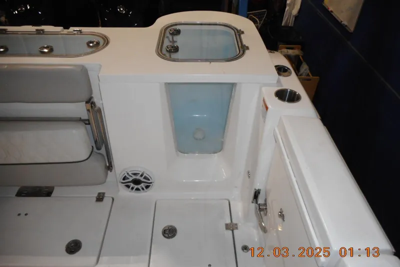 Slide: The Image of 2023 Sea Fox 288 Commander boat interior with seating and storage compartments. - 36