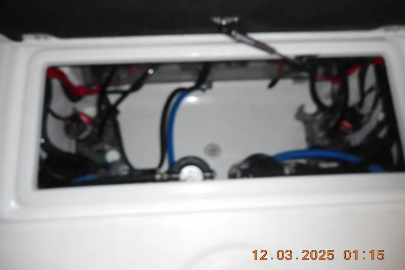 Slide: The Image of Blurred view of 2023 Sea Fox 288 Commander engine compartment with wiring. - 42