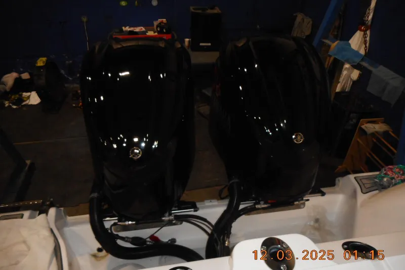 Slide: The Image of Twin black outboard engines on a 2023 Sea Fox 288 Commander boat. - 43