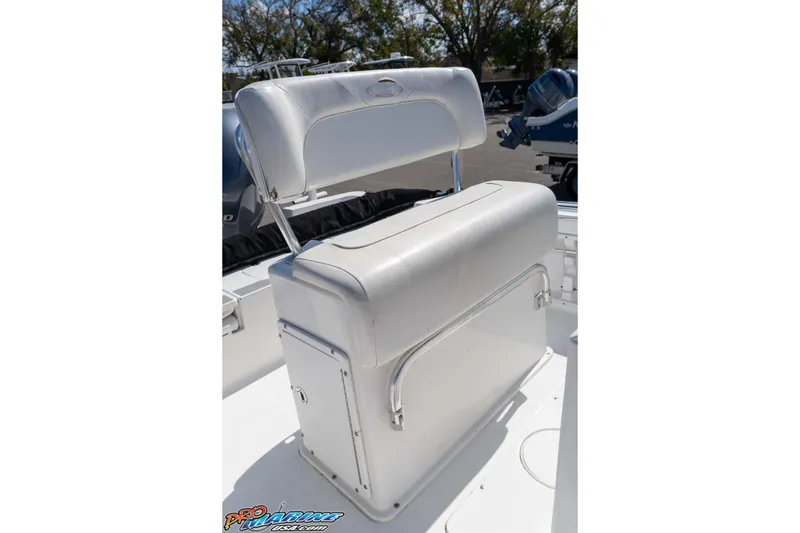 Slide: The Image of 2014 Sea Hunt BX 22 Pro boat seat with storage compartment, white upholstery. - 19