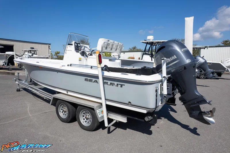 Slide: The Image of 2014 Sea Hunt BX 22 Pro boat on trailer with Yamaha 200 engine. - 28