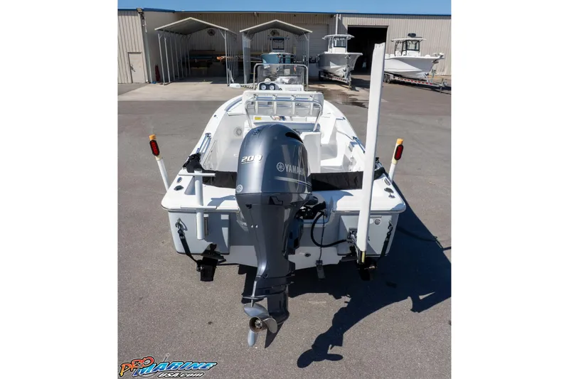 Slide: The Image of 2014 Sea Hunt BX 22 Pro boat with Yamaha 200 engine, parked outdoors. - 31