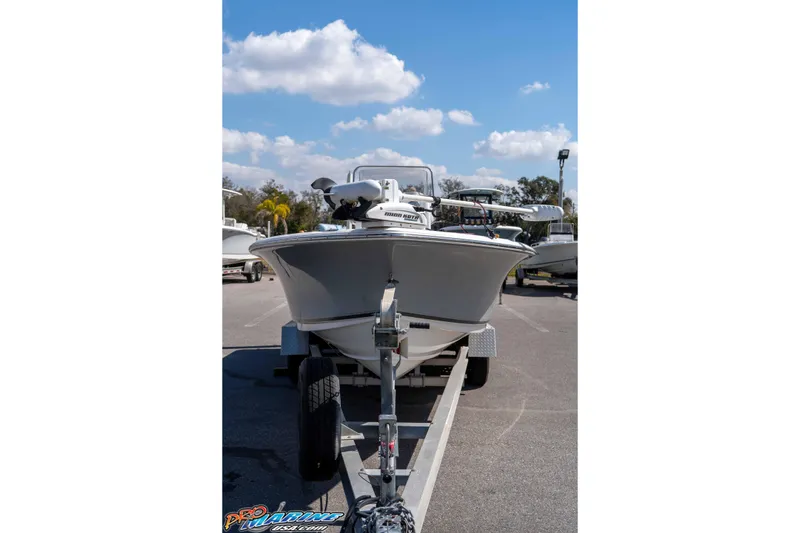 Slide: The Image of 2014 Sea Hunt BX 22 Pro boat on trailer under blue sky. - 4
