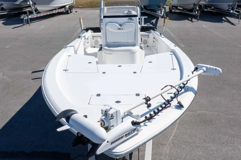 Slide: The Image of 2014 Sea Hunt BX 22 Pro boat with trolling motor, parked on a trailer. - 40