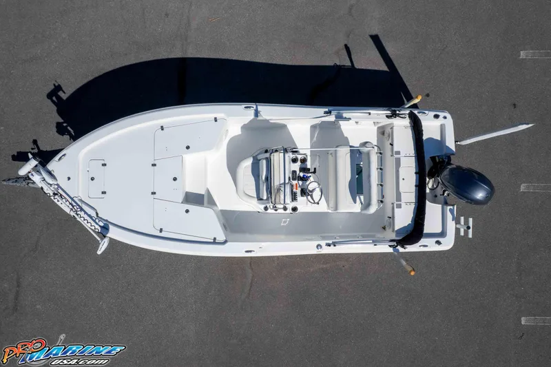 Slide: The Image of Overhead view of a 2014 Sea Hunt BX 22 Pro boat on pavement. - 44