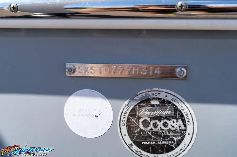 Slide: The Image of 2014 Sea Hunt BX 22 Pro boat with serial number and Coosa Composites certification. - 7
