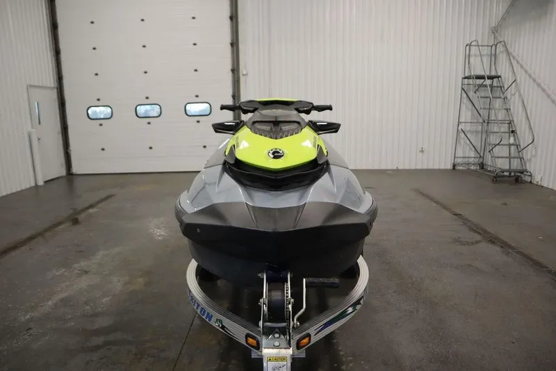 The Image of 2021 Sea-Doo GTI SE 170 jet ski in a garage, front view. - 1