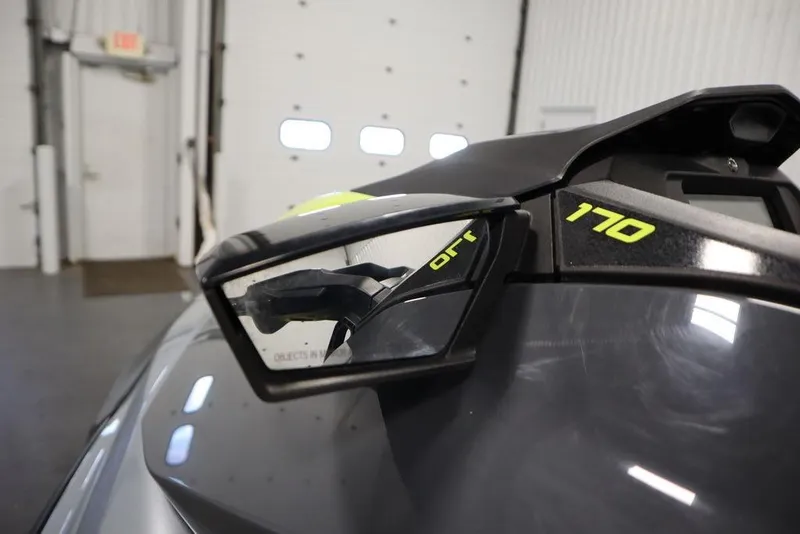 Slide: The Image of 2021 Sea-Doo GTI SE 170 jet ski, close-up of side mirror and model number. - 11