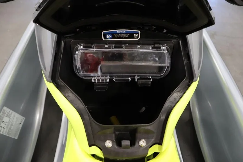 Slide: The Image of 2021 Sea-Doo GTI SE 170 storage compartment with clear cover, open view. - 14