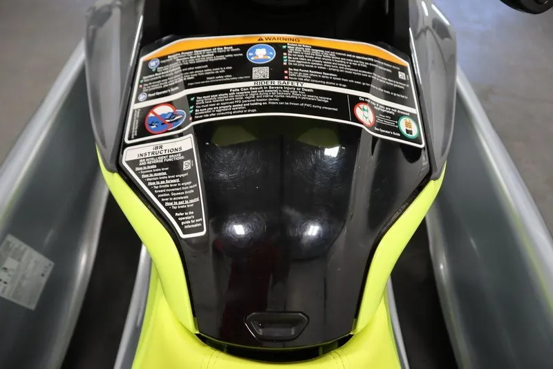 Slide: The Image of 2021 Sea-Doo GTI SE 170 dashboard with safety instructions and warning labels. - 15