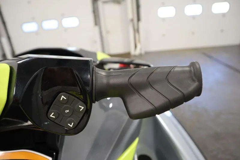 Slide: The Image of Close-up of 2021 Sea-Doo GTI SE 170 handlebar with control buttons. - 16