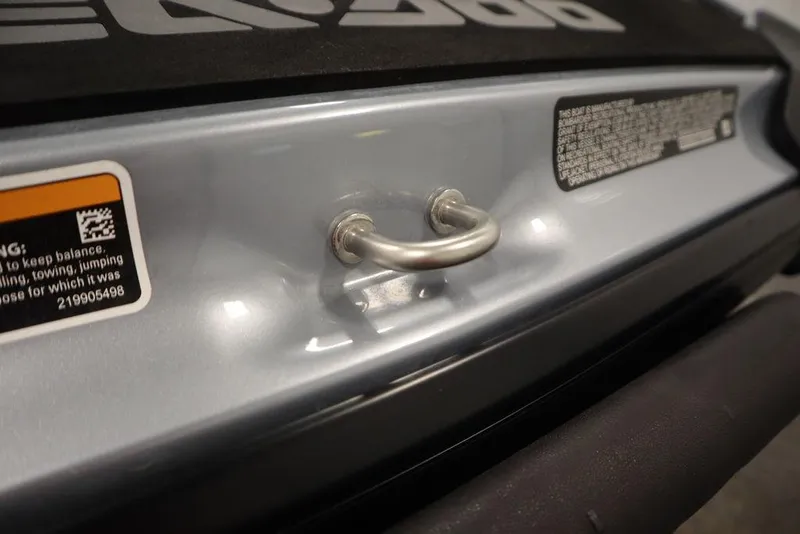 Slide: The Image of 2021 Sea-Doo GTI SE 170 rear detail with safety warning labels. - 18