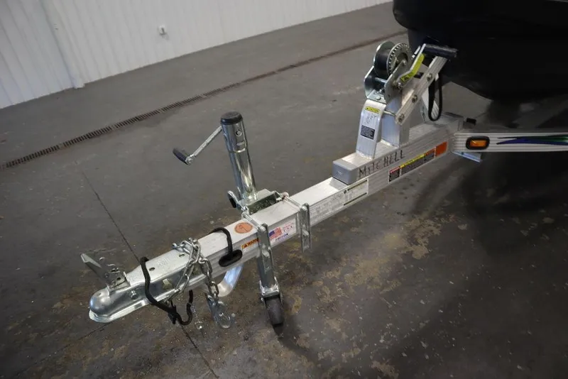 Slide: The Image of Trailer hitch for 2021 Sea-Doo GTI SE 170 in a garage setting. - 21