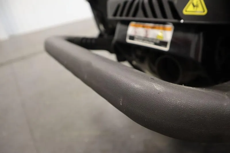 Slide: The Image of Close-up of 2021 Sea-Doo GTI SE 170 bumper detail in a garage setting. - 23