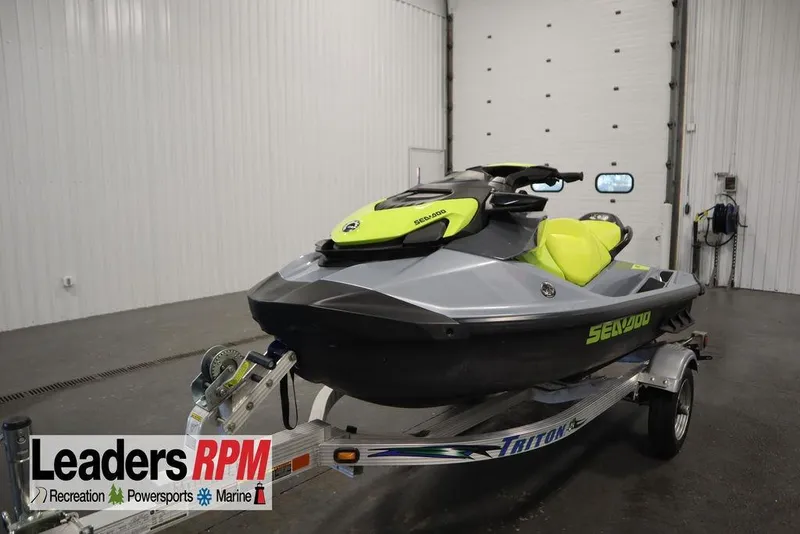 Slide: The Image of 2021 Sea-Doo GTI SE 170 jet ski on trailer in indoor showroom. - 4