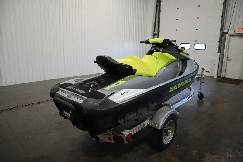 Slide: The Image of 2021 Sea-Doo GTI SE 170 jet ski on trailer in a garage. - 8