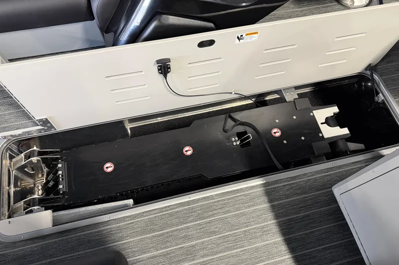 Slide: The Image of Interior view of 2025 Premier 230 Sunsation Angler 2pt storage compartment. - 20
