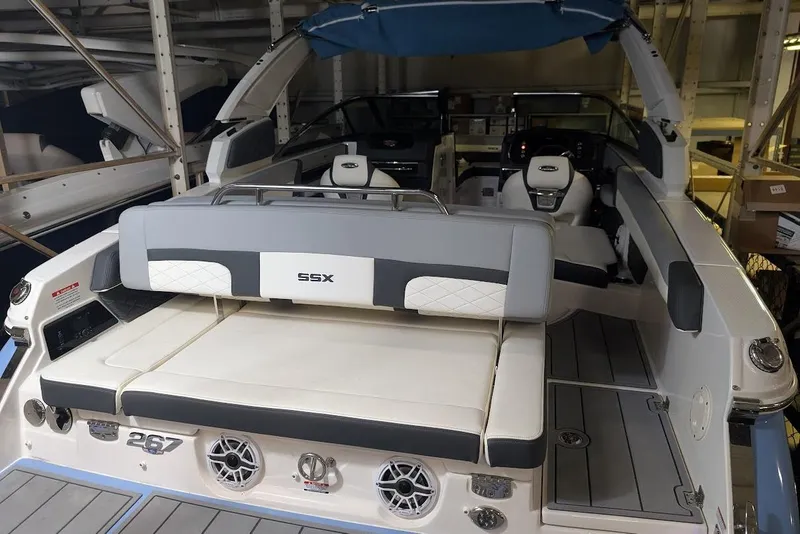 Slide: The Image of 2024 Chaparral 267 SSX boat interior with luxurious seating and modern design. - 12