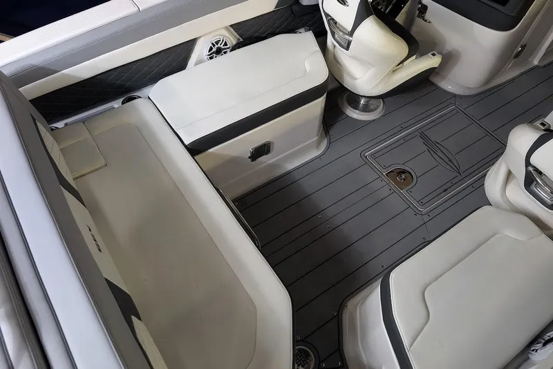 Slide: The Image of 2024 Chaparral 267 SSX boat interior with sleek seating and modern design. - 14