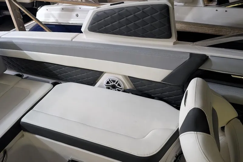 Slide: The Image of 2024 Chaparral 267 SSX boat interior with luxurious seating and stylish design. - 18