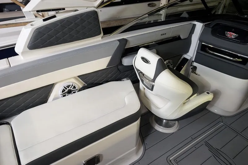 Slide: The Image of 2024 Chaparral 267 SSX boat interior with luxurious seating and modern design. - 19