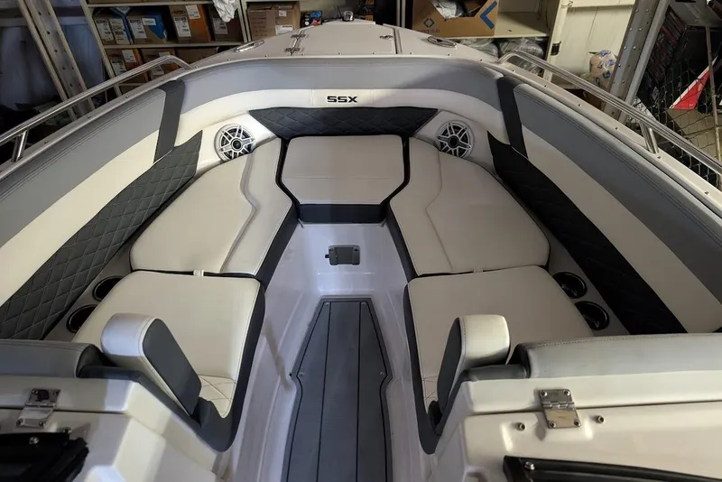 Slide: The Image of 2024 Chaparral 267 SSX boat interior with luxurious seating and modern design. - 24