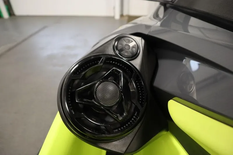 Slide: The Image of Close-up of 2018 Sea-Doo RXT-X 300 speaker system, featuring sleek black design. - 12