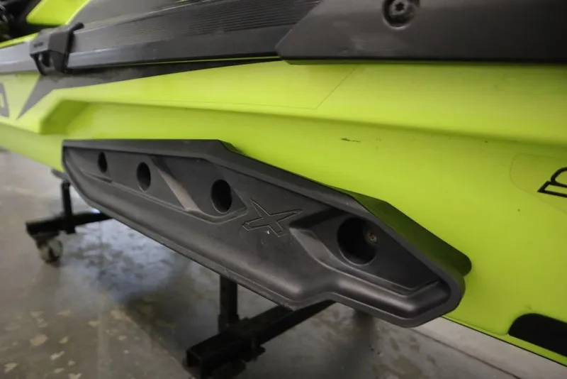 Slide: The Image of Close-up of a 2018 Sea-Doo RXT-X 300 jet ski in vibrant yellow. - 21