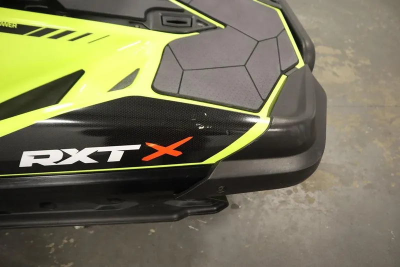 Slide: The Image of 2018 Sea-Doo RXT-X 300, close-up of vibrant design and logo. - 23