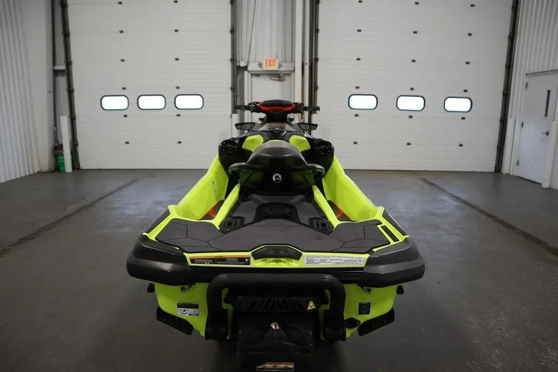Slide: The Image of 2018 Sea-Doo RXT-X 300 jet ski in a garage, rear view. - 8
