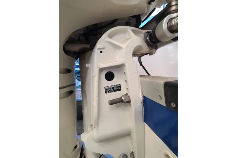 Slide: The Image of Close-up of a 2021 Campion Chase 20 boat engine component, showcasing mechanical details. - 14