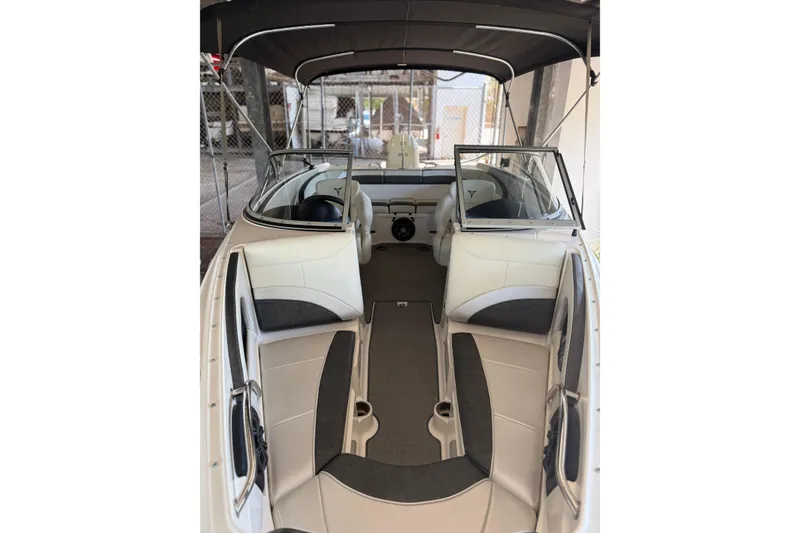 Slide: The Image of Interior view of 2021 Campion Chase 20 boat with seating and steering wheel. - 4
