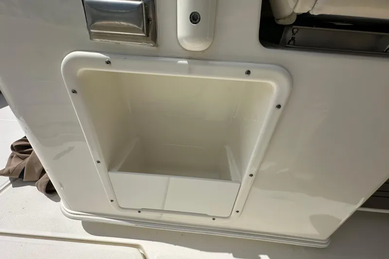 Slide: The Image of Storage compartment on a 2018 Boston Whaler 350 Outrage boat. - 25