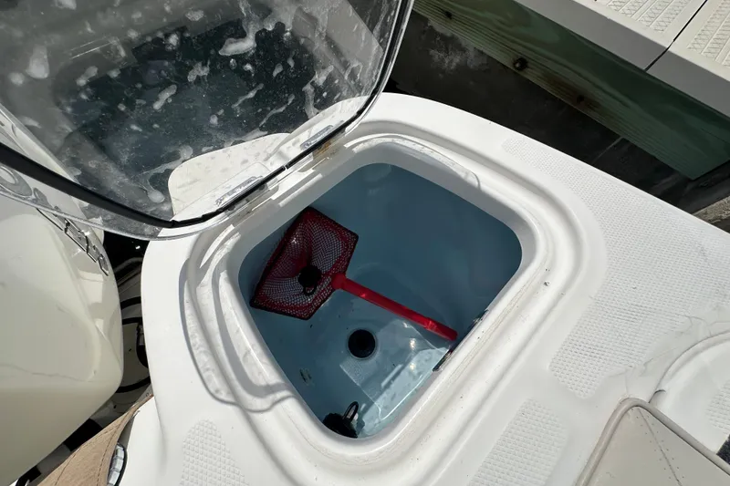 Slide: The Image of Open hatch on 2018 Boston Whaler 350 Outrage with red net inside. - 35
