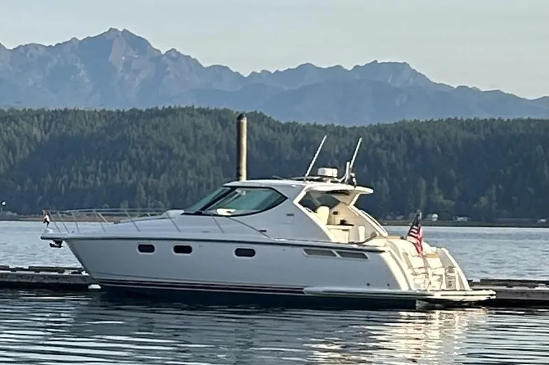 The Image of 2008 Tiara Yachts 3900 Sovran docked with scenic mountain backdrop. - 0