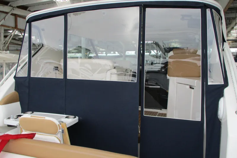 Slide: The Image of 2008 Tiara Yachts 3900 Sovran interior with protective cover and seating. - 17