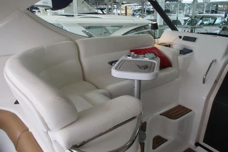 Slide: The Image of Luxurious interior seating of 2008 Tiara Yachts 3900 Sovran with elegant white upholstery. - 25
