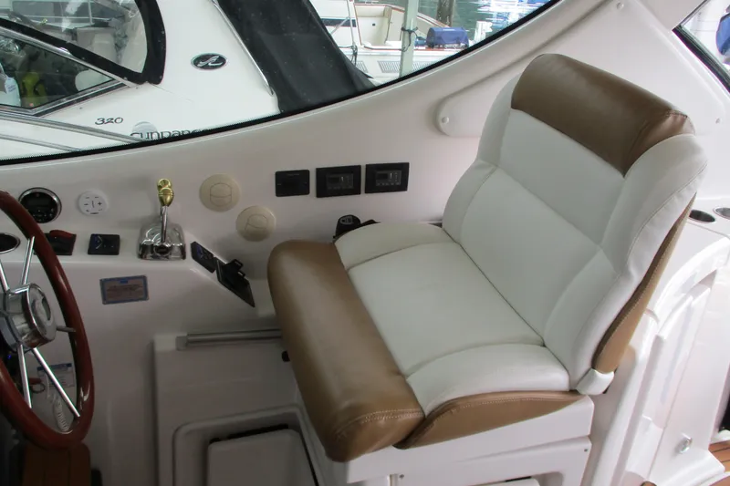 Slide: The Image of Captain's seat and helm controls on a 2008 Tiara Yachts 3900 Sovran. - 29