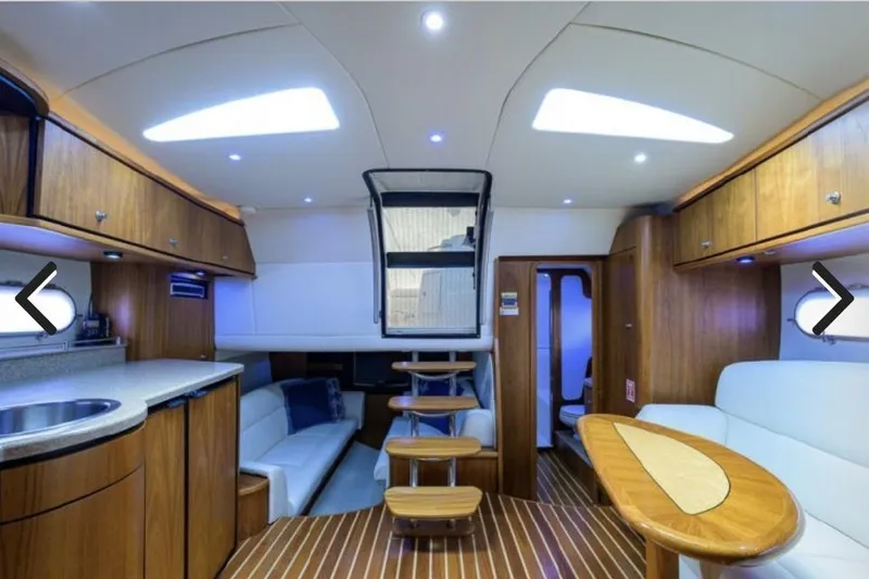Slide: The Image of Luxurious interior of 2008 Tiara Yachts 3900 Sovran with elegant wood finishes and modern amenities. - 31